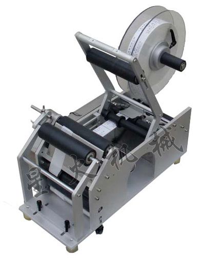 半自動圓瓶貼標(biāo)機(jī)